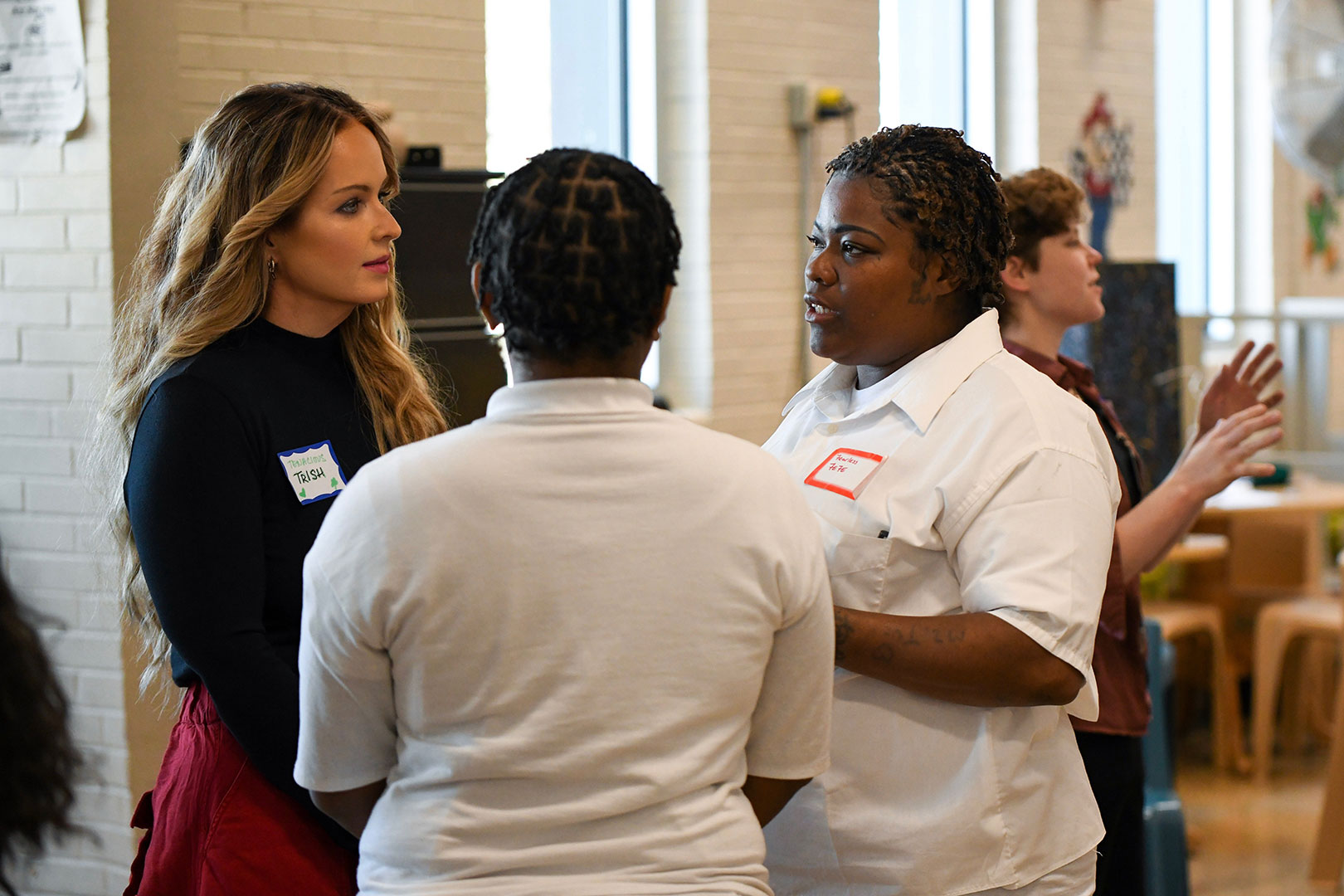 Trish talking to Fefe and Desiree